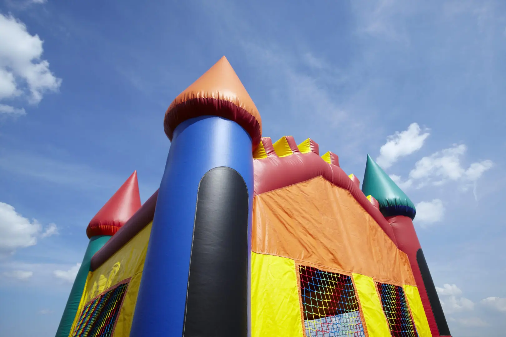 Colorful inflatable castle bounce house.